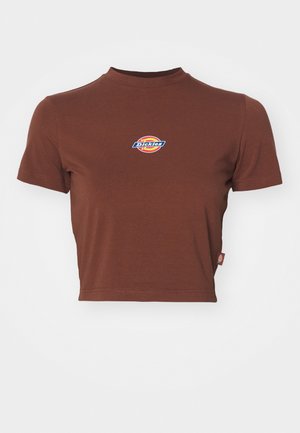 Brown cropped t-shirt with a ribbed high neckline and short sleeves. Features a circular "Dickies" logo in blue and yellow at the chest.
