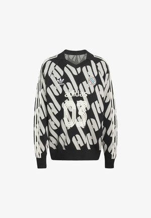 Zwarte trui met abstract wit patroon, voorzien van een v-hals, lange mouwen, drie strepen op de armen en bedrukking met '03' en 'adidas'.