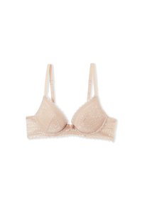 Reggiseno color beige chiaro con pizzo, dotato di coppe imbottite e leggermente curve, spalline regolabili e un fiocco decorativo sul fronte. Dettaglio a righe orizzontali sulla banda.
