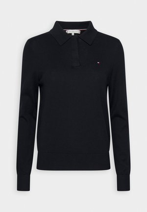 Zwart gebreid poloshirt met lange mouwen, kraag, knoopsluiting, geribde manchetten en zoom, en een klein Tommy Hilfiger-logo op de borst.