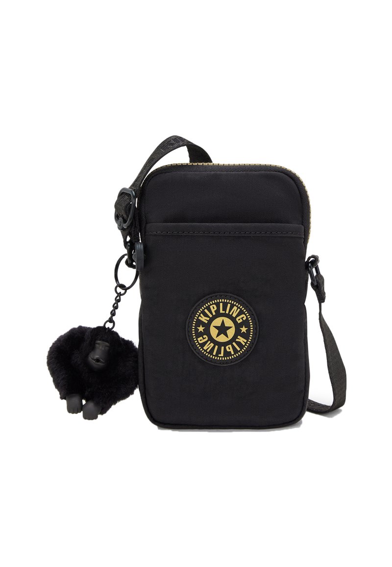 Borsa a tracolla nera in nylon con chiusura a zip, caratterizzata da un logo circolare Kipling, tasca frontale e un portachiavi a forma di scimmietta nera e pelosa.