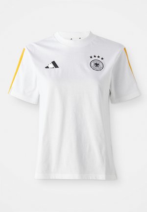 Bijela pamučna majica s crnim adidas logom, kružnim njemačkim grbom i žutim akcentima na ramenima. Kratki rukavi i okrugli izrez.
