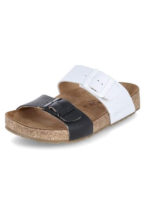 Offene Sandale mit Korksohle, schwarzen und weißen Lederriemen und verstellbaren Schnallen an jedem Riemen.