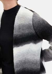 Cartoon Kofta - black