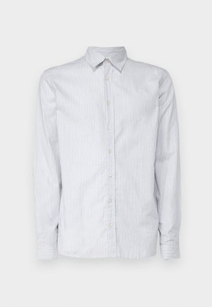 Vaaleansininen raidallinen pitkähihaisettu paita puuvillakankaasta. Ominaisuuksiin kuuluu klassinen kaulus, napitettava etuosa ja kapeat hihansuut, joissa on vastaavat raidat.