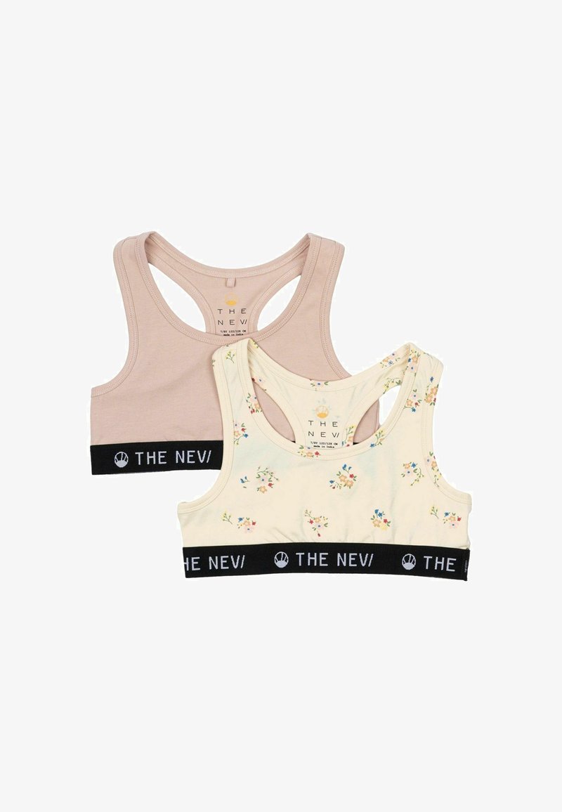 Két vágott melltartó: az egyik világosbarna, a másik krémszínű virágmintás. Mindkettő fekete elasztikus pánttal rendelkezik, fehér logóval és sportos hátrész kialakítással.