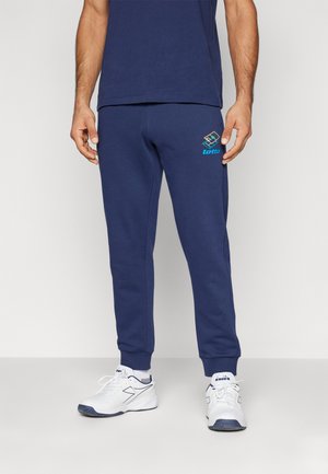 SWEATPANTS HERITAGE - Trainingsbroek - peacock
