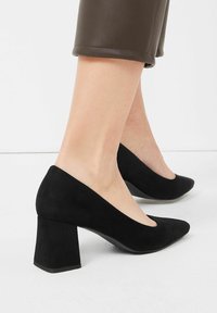 Next Avokkaat - black