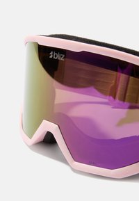 Skibril met een roze frame en paarse glazen. Beschikt over een zachte binnenvoering voor comfort en branding aan de bovenkant.
