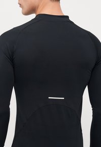 Champion TRAINING KOMPRESSION MOCK NECK LONG SLEEVES - Langarmshirt - black