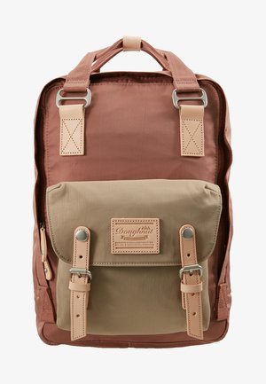 Brown and khaki backpack featuring a front pocket, leather accents, adjustable straps, and a sleek, durable material.