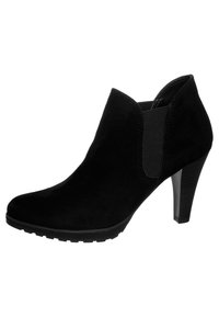 Botín de ante negro con punta afilada, paneles laterales elásticos y tacón apilado de 3.5 pulgadas; suela exterior texturizada para agarre y estabilidad.