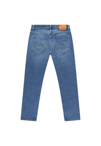 Lichtblauwe denim jeans met een slim-fit. Voorzien van kleine achterzakken en een bruin lederen label op de tailleband. Gladde textuur.
