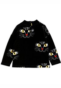 Maglietta nera a maniche lunghe realizzata in tessuto morbido, decorata con molteplici facce di gatti con occhi gialli, nasi rossi e baffi bianchi. Chiusura con bottoni sul retro.