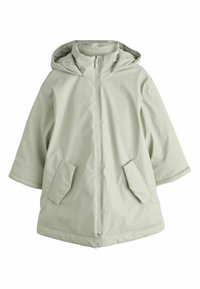 Gaiši zaļa necaurlaidīga jaka ar rāvējslēdzēja priekšpusi, kapuci un divām priekšējām kabatām. Raksturo brīvs piegriezums un vidēja garuma dizains. Gluda tekstūra.