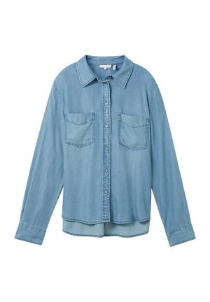 Light blue denim shirt with long sleeves, button closure, and two front patch pockets. Features a classic collar and a slightly curved hem.