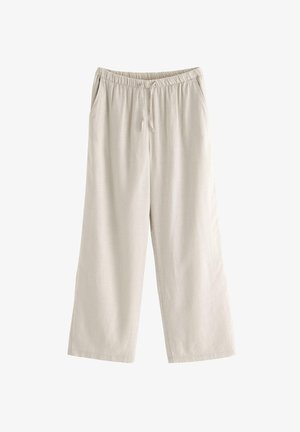 Lysebeige vidde bukser med elastisk talje og snøre, med sidelommer, vist på en ensfarvet hvid baggrund.