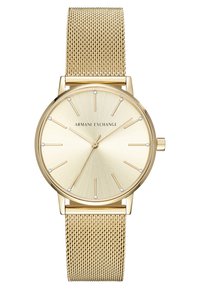 Gold stainless steel watch with a mesh band. Round face featuring a brushed gold dial, hour markers, and crystal accents.