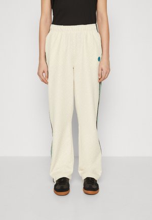 Tommy Hilfiger TAPE RELAXED - Tracksuit bottoms - calico
