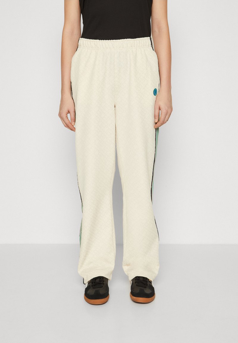 Tommy Hilfiger TAPE RELAXED - Tracksuit bottoms - calico