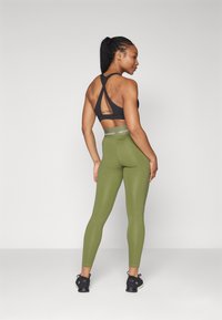 New Balance NB SLEEK HIGH RISE SPORT 25 - Leggings - dark olivine