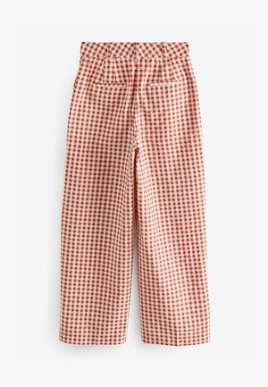 Rote und cremefarbene Karohosen mit hoher Taille, weitem Bein, zwei Gesäßtaschen und Gürtelschlaufen; glatter Stoff mit karierter Musterung.