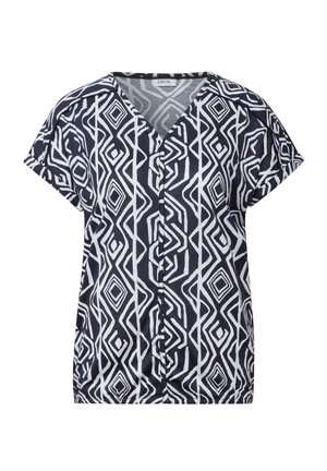 Blusa de manga corta en navy con patrón geométrico blanco, con escote en V y un corte relajado. La tela parece ligera y suave.