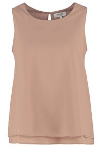 Blouse beige sans manches avec encolure ronde, petite fermeture à bouton au dos et ourlet légèrement superposé.