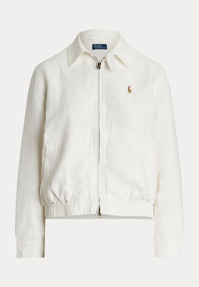White linen bomber jacket with a zip front, elastic waistband, and long sleeves. Features a small, embroidered logo on the left chest.