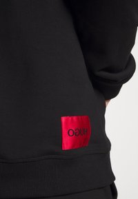HUGO Jersey con capucha - black