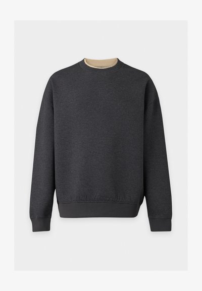 Sweat-shirt gris foncé à col rond avec manches longues et poignets et ourlet côtelés, présenté sur un fond clair uni.