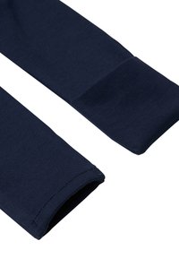 Langärmeliges Hemd aus Baumwolle in Marineblau mit Ripptextur an den Bündchen, ausgestattet mit sauberen Kanten und einem schmalen Schnitt. Einfach und ungeschmückt.