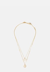 Gold-tone layered necklace with two chains. Features circular pendants, one with intricate detailing and the other smooth.