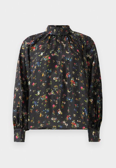 Must mustriid pikkade varrukatega, kõrge krae ja kokku tõmmatud kaelusega. Omab elavat lillemustrit mitmesugustes värvides siledal kangal.