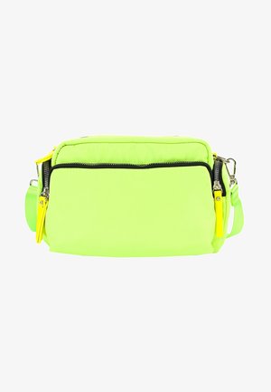 Petit sac bandoulière vert néon avec deux compartiments zippés et tirettes de fermeture éclair jaunes, sur fond blanc.