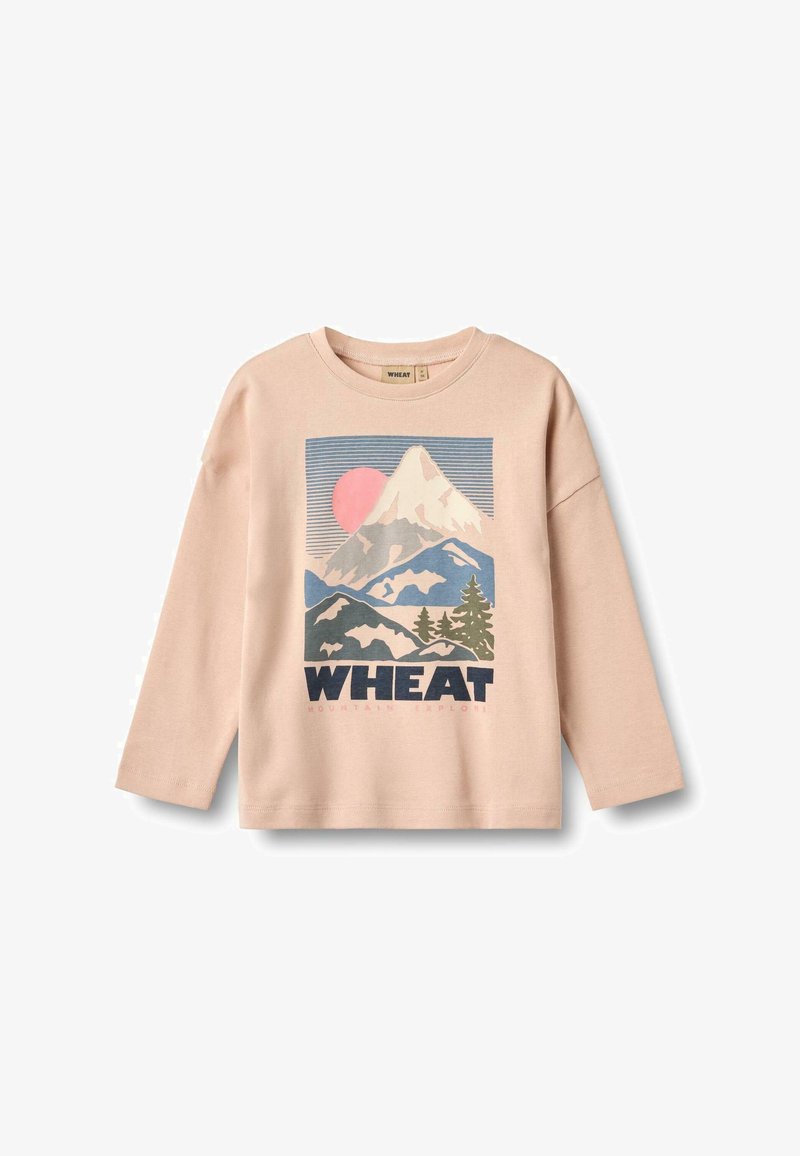 Világos rózsaszín, hosszú ujjú pulóver hegy grafikai mintával, "WHEAT" felirattal, fával díszítve, és pasztell színekben napábrázolással.