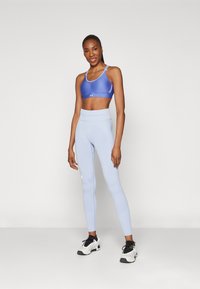 Under Armour TRAIN SEAMLESS - Leggings - celeste/white