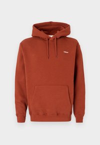 Rust-colored hoodie made of fleece, featuring a kangaroo pocket, drawstring hood, and small white logo on the upper left.