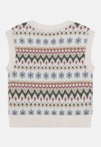 Ærmeløs sweater i creme med et farverigt geometrisk mønster. Har en blød strikket tekstur med blå, grønne, brune og røde accenter.