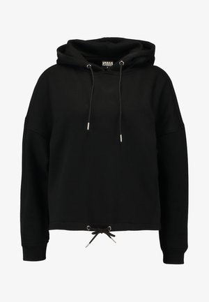 Svart hettegenser laget av myk stoff, med snorhette, sølvfarge detaljer og en avslappet passform med innsnevring i livet.