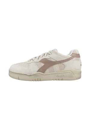 White suede sneaker with light brown accents, featuring a textured side panel, round toe, lacing system, and a rubber sole.