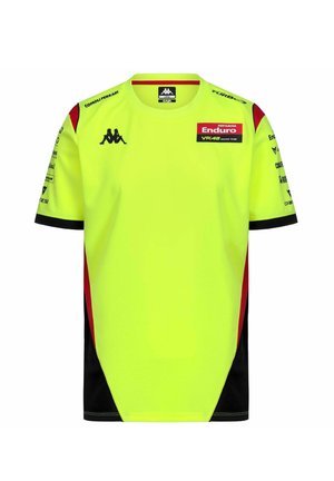 Maillot de course jaune vif avec des accents noirs et rouges, comportant plusieurs logos de sponsors, notamment Kappa et Pertamina Enduro VR46.