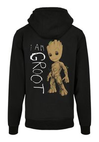 Svart hettegenser laget av bomullsblanding med en tegneseriefigur av Groot og tekst som sier "jeg ER GROOT" i hvitt. Trykt design på baksiden.