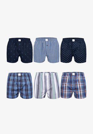 Seis pares de calzoncillos de hombre: uno en azul marino con patrones, otro de cuadros en varios colores, uno rayado en gris y verde, todos con cinturillas elásticas y botones.