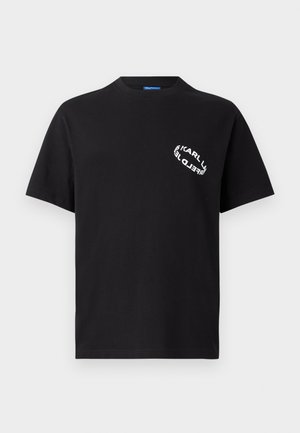 Black cotton t-shirt featuring short sleeves and a crew neck. A white graphic logo is printed on the left chest. Simple, casual design.