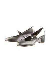 Metallic silver block-heeled shoes with a rounded toe and a decorative strap across the instep. Smooth texture with a shiny finish.