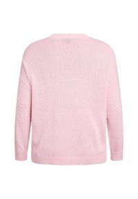 Ružový pletený sveter s voľným strihom, s rebrovaným lemom a textúrovanými vzormi srdca na rukávoch. Mäkký, ľahký materiál.