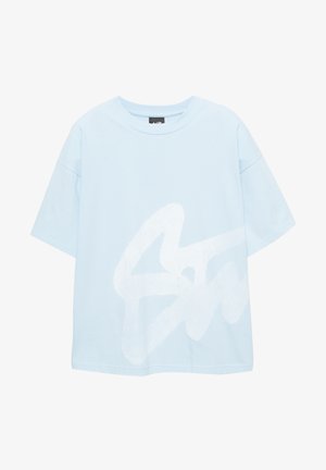 T-shirt in cotone azzurro chiaro con maniche corte e vestibilità ampia, con un grande motivo grafico astratto bianco sul davanti.