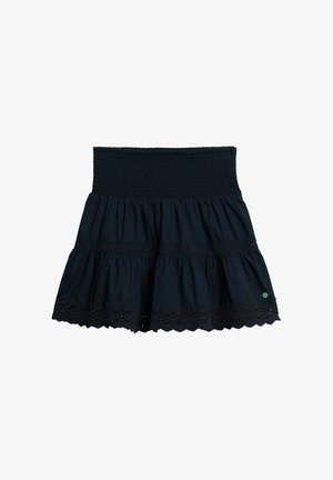 Falda de nivelada en azul marino con cintura fruncida y borde de encaje en el dobladillo. Fabricada con un tejido liviano y de textura suave.