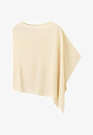 Poncho en tricot asymétrique beige clair avec un large col et un ourlet drapé sur un côté.